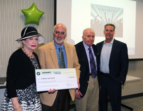 Perry Matsa, Aaron Bock and Samuel Matsa from the Yorktown Teen Center are pictured with George Troyano, the President and Publisher of The Journal News/lohud.com, during a Gannett Foundation Grant ceremony in White Plains, Feb. 17, 2016.